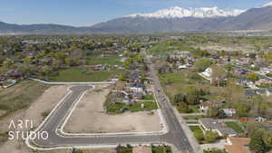 Birds eye view of property with a residential view and a mountain view