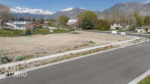 Exterior space with a residential view and a mountain view