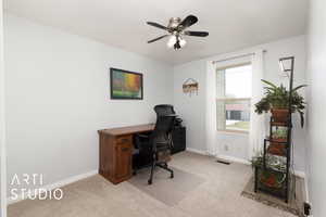 Office with baseboards, carpet, a ceiling fan, and visible vents