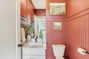 Bathroom with toilet and vanity