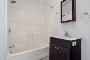 Full bath with tub / shower combination and vanity