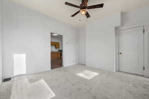 Unfurnished bedroom featuring carpet floors and baseboards