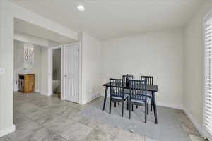 Dining area featuring recessed lighting, baseboards, and visible vents