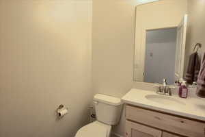 Bathroom with vanity and toilet