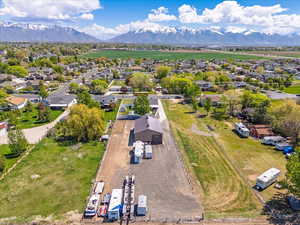 Drone / aerial view featuring a residential view and a mountain view