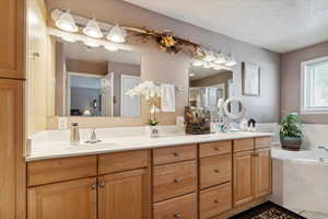 Master bath with double sink, separate shower and bath
