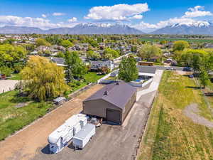 Birds eye view of property featuring a residential view and a mountain view