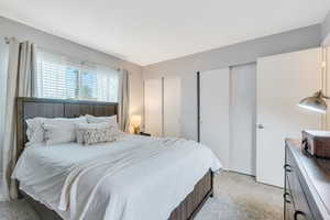Bedroom with multiple closets
