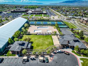Birds eye view of property with a mountain view and a residential view