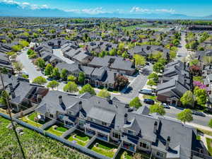 Birds eye view of property featuring a residential view and a mountain view