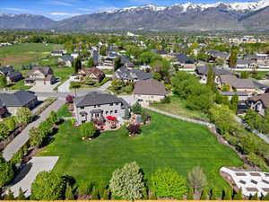 Birds eye view of property featuring a residential view and a mountain view