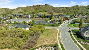 Aerial view featuring a residential view and a mountain view