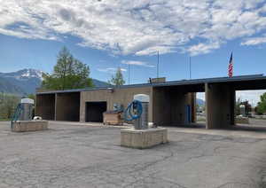 View of property with a mountain view