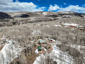 Snowy aerial view with a mountain view