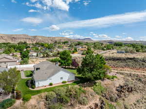 Birds eye view of property featuring a mountain view and a residential view