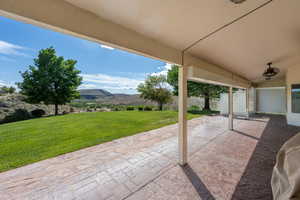 View of patio / terrace with a mountain view