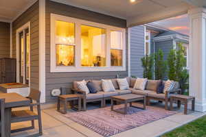 View of outdoor living space under covered patio