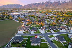 Aerial view at dusk with a mountain view and a residential view