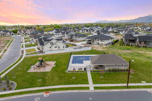 Aerial view at dusk with a mountain view and a residential view