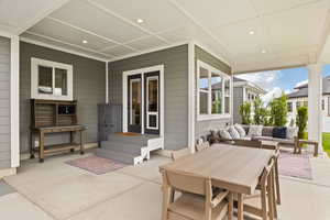 View of patio with an outdoor hangout area