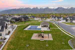 Birds eye view of property with a mountain view and a residential view