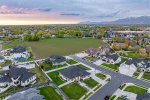 Drone / aerial view featuring a mountain view and a residential view