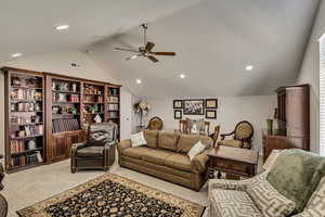 Living area featuring visible vents, light colored carpet, recessed lighting, a ceiling fan, and vaulted ceiling