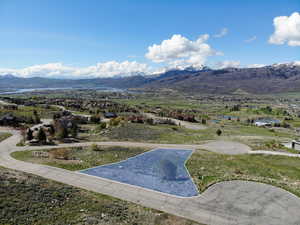 Property view of mountains featuring a water view