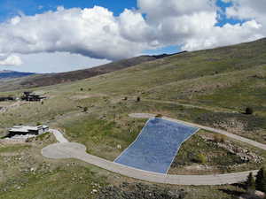 Drone / aerial North view featuring a mountain view