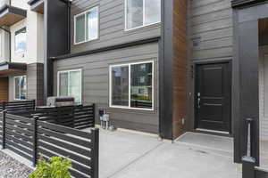 Entrance to property with a patio area