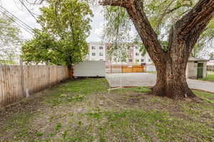 View of yard with a fenced backyard