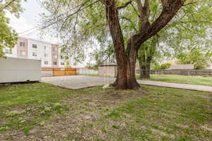 View of yard featuring fence