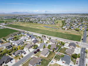 Drone / aerial view with a residential view and a mountain view