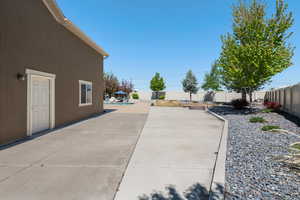 View of patio / terrace with a fenced in pool and a fenced backyard