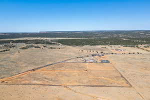 Aerial view with a rural view and view of desert