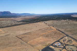 Aerial view with a desert view, a mountain view, and a rural view