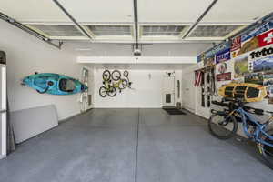 Garage featuring a garage door opener