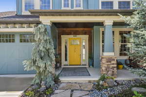 Doorway to property with a porch
