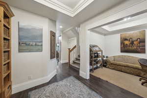 Interior space featuring recessed lighting, baseboards, stairs, and wood finished floors