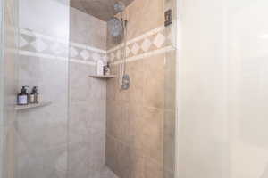 Bathroom with tiled shower
