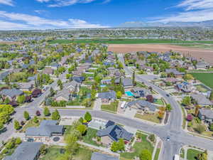 Birds eye view of property featuring a residential view and a mountain view