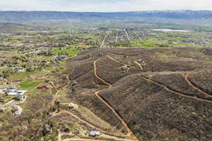 Aerial view with a mountain view and a rural view