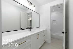 Full bath with vanity, recessed lighting, and tub / shower combination