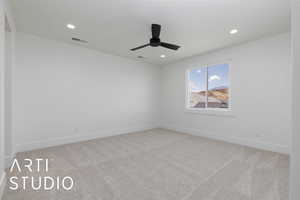 Carpeted empty room with baseboards, ceiling fan, and recessed lighting