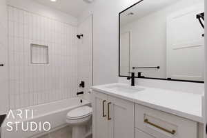 Full bath featuring toilet, vanity, washtub / shower combination, and tile patterned flooring
