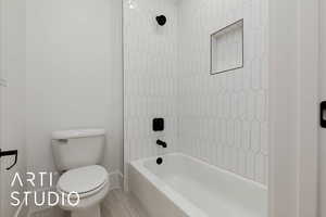 Full bath with toilet, shower / bathtub combination, and baseboards