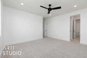 Unfurnished room featuring light carpet, ceiling fan, recessed lighting, and baseboards