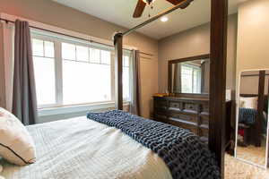 Bedroom featuring recessed lighting and a ceiling fan