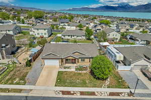 Bird's eye view with a water and mountain view and a residential view