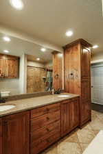 Full bath featuring recessed lighting and a sink